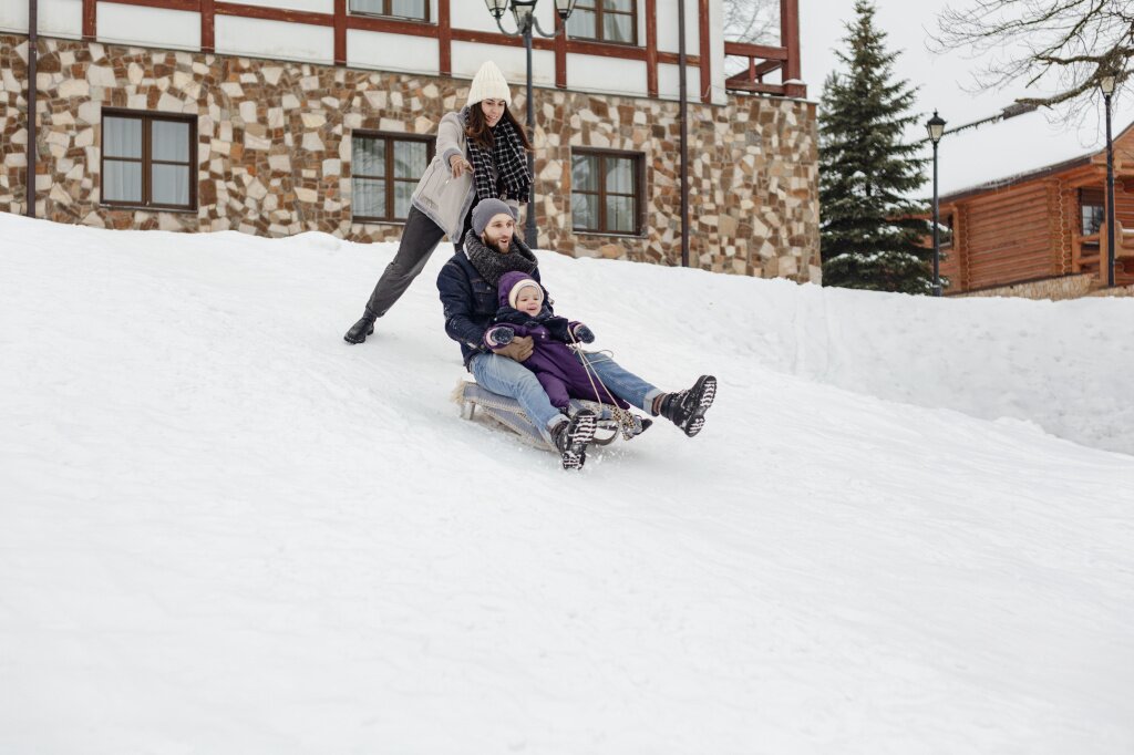 child-enjoying-winter-activities-with-their-family.jpg