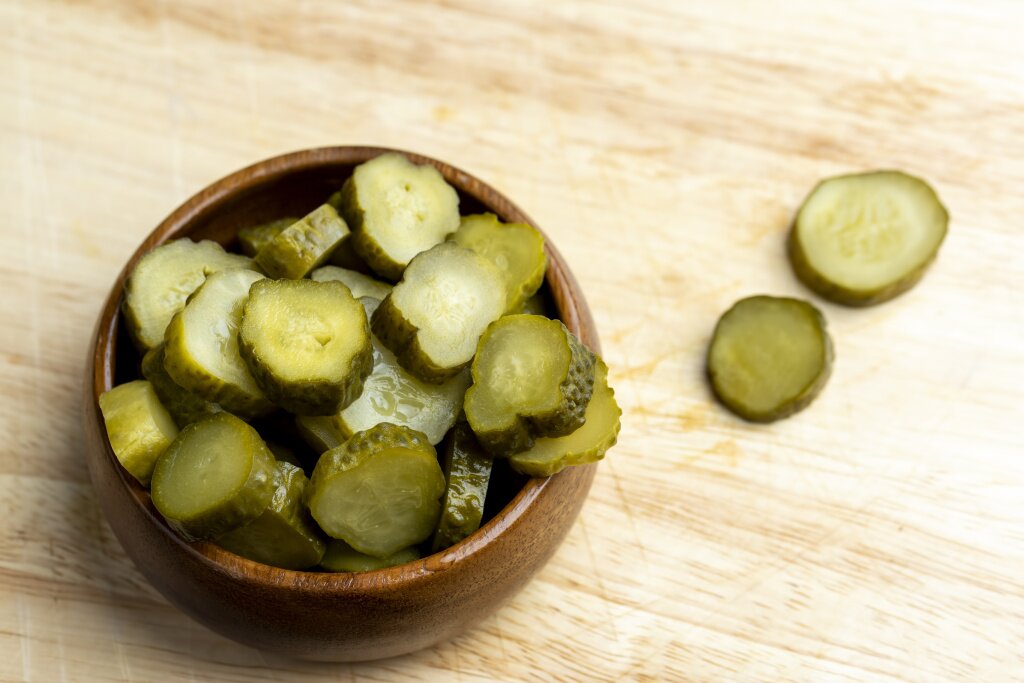 pickled-cucumbers-wooden-table-cooking-salty-sour-pickled-cucumbers-with-spices.jpg