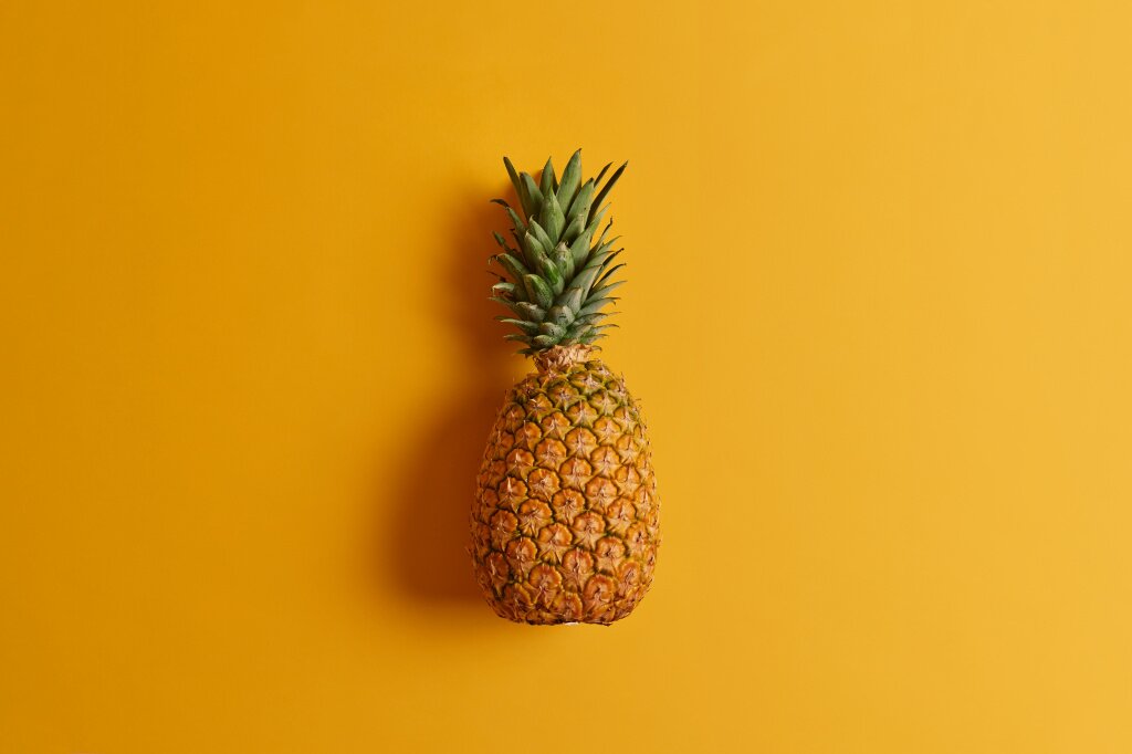 ripe-pineapple-isolated-yellow-background-exotic-fruit-low-calories-loaded-with-nutrients-antioxidants-can-be-consumed-variety-ways-added-your-diet-ingredient-making-juice.jpg