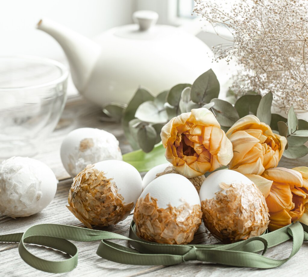 festive-composition-easter-holiday-with-decorated-eggs-fresh-flowers.jpg