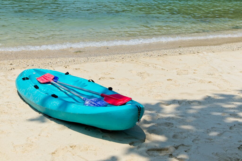 blue-row-boat-beach-with-beautiful-ocean.jpg