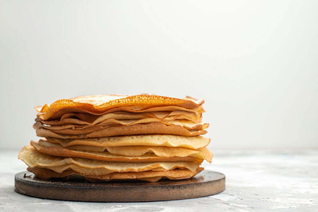 front-view-delicious-round-pancakes-delicious-baked-pancake-pastry-cooking.jpg