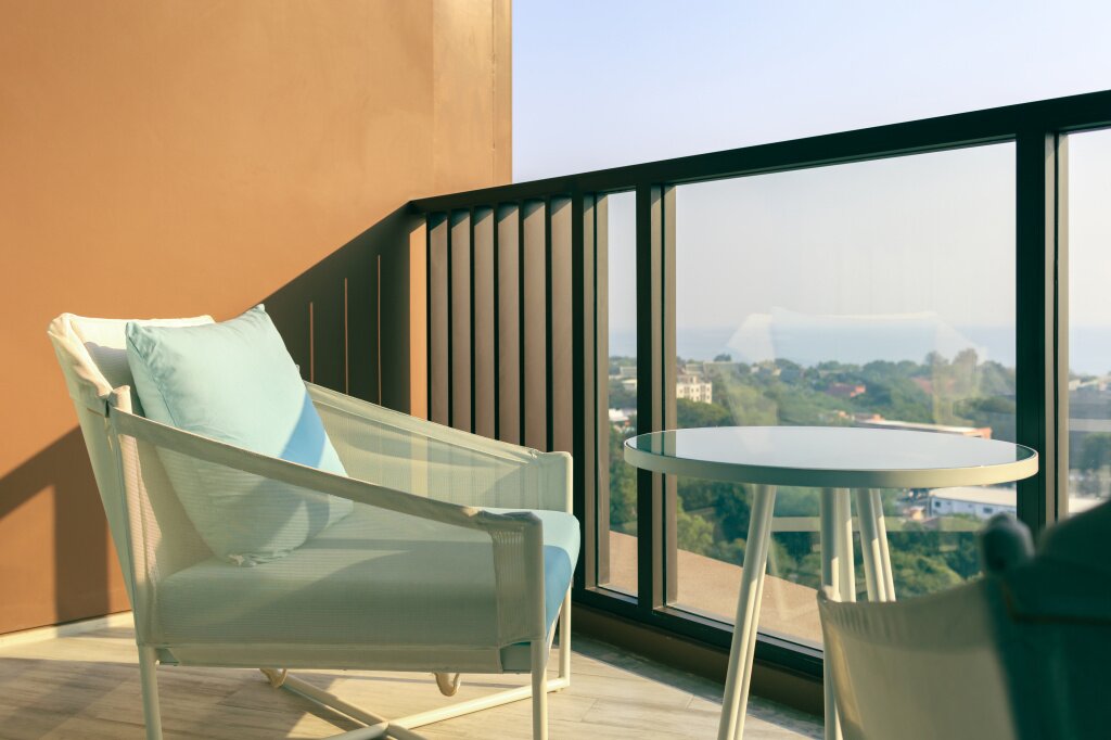 easy-chair-balcony-hotel-with-morning-sunlight.jpg