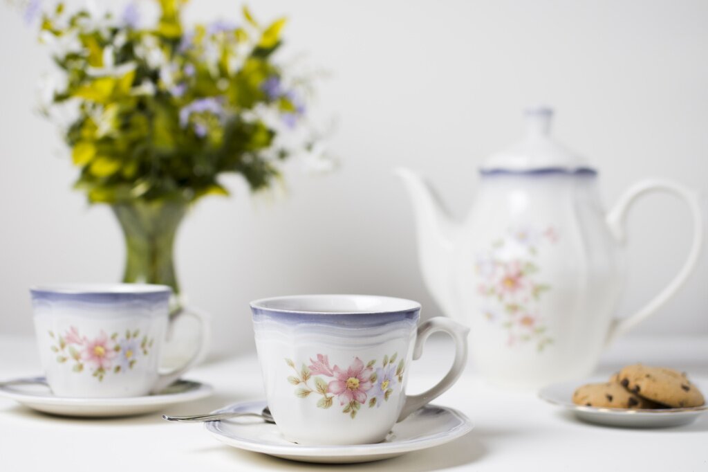 ceramics-tea-cups-cookies-white-table.jpg