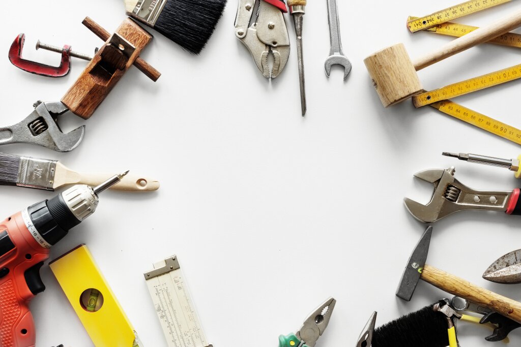 flat-lay-various-technician-tools-isolated-white-background.jpg