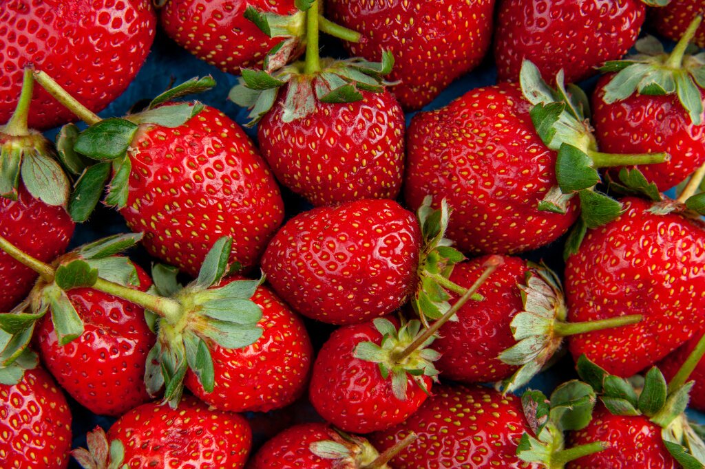 top-view-red-strawberries-blue-background.jpg