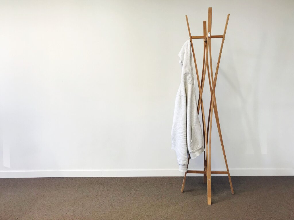 clothes-rack-against-wall-home.jpg