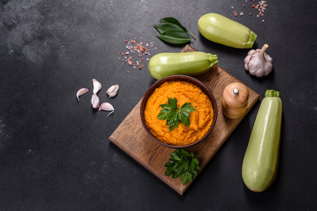 squash-caviar-with-garlic-tomatoes-rustic-bowl-dark-background.jpg